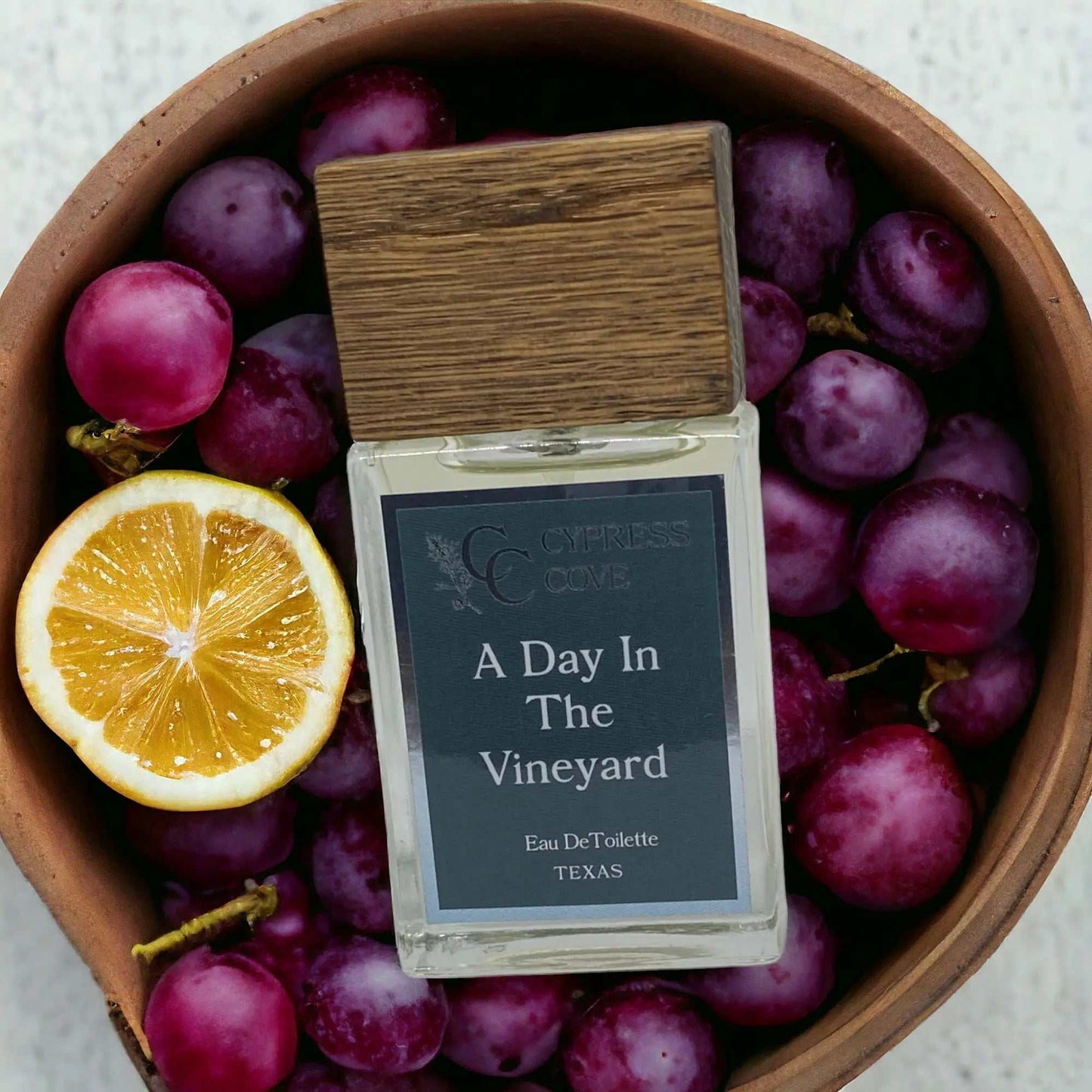 Bottle of winery inspired perfume with berry and herbal notes, handcrafted by Cypress Cove.