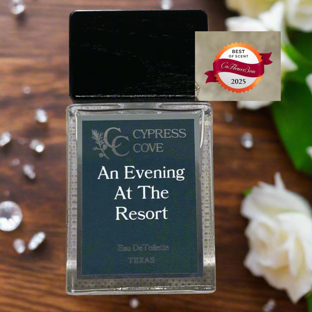 Bottle of An Evening At The Resort perfume with night jasmine and velvet mahogany notes