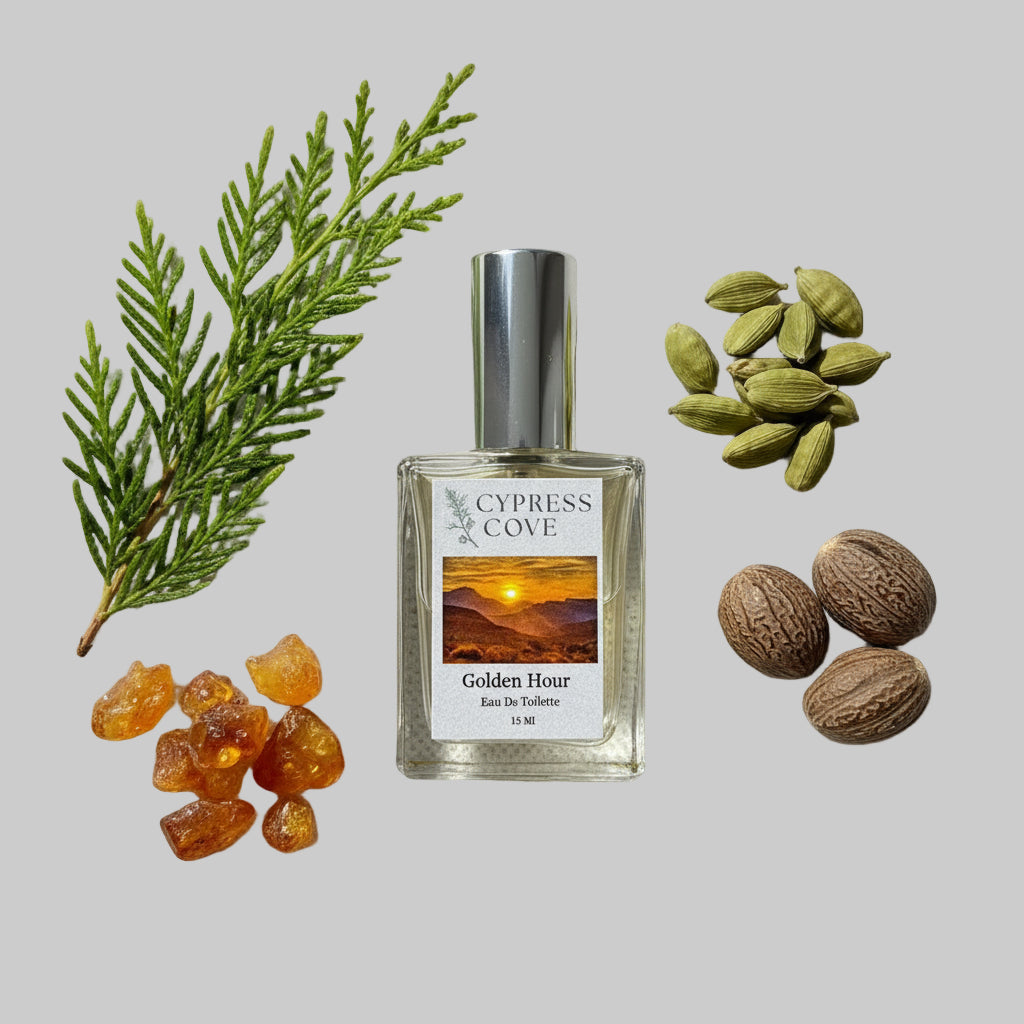 Perfume bottle labeled 'Cypress Cove Golden Hour' flatlay