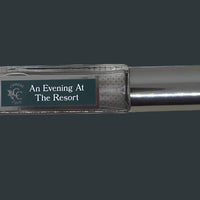 elegant perfume in a travel vial